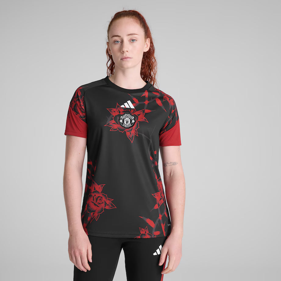 Manchester United 2026/27 pre match shirt, red and white, front view on model