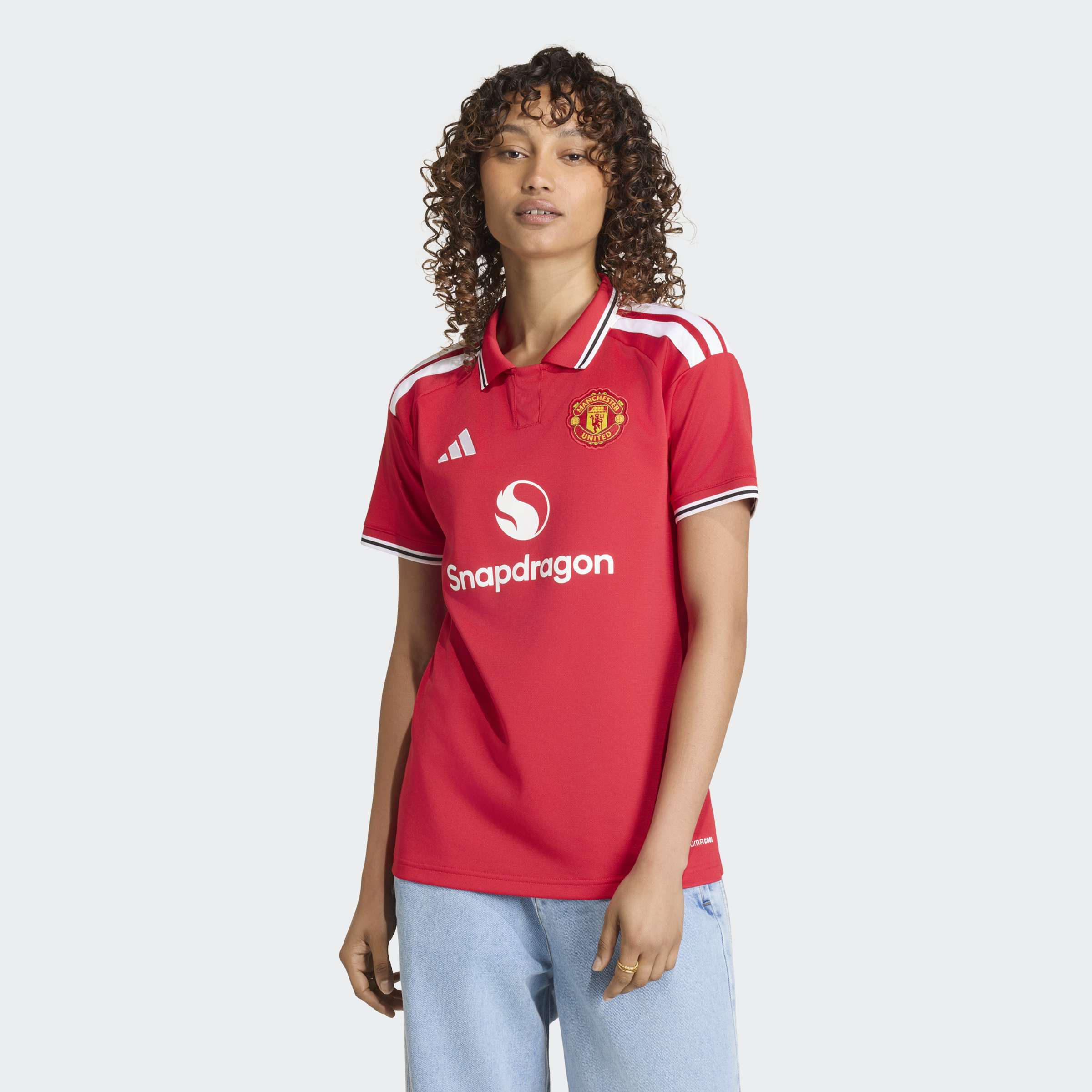 manchester united 2026/27 home shirt, red and white, front view on model